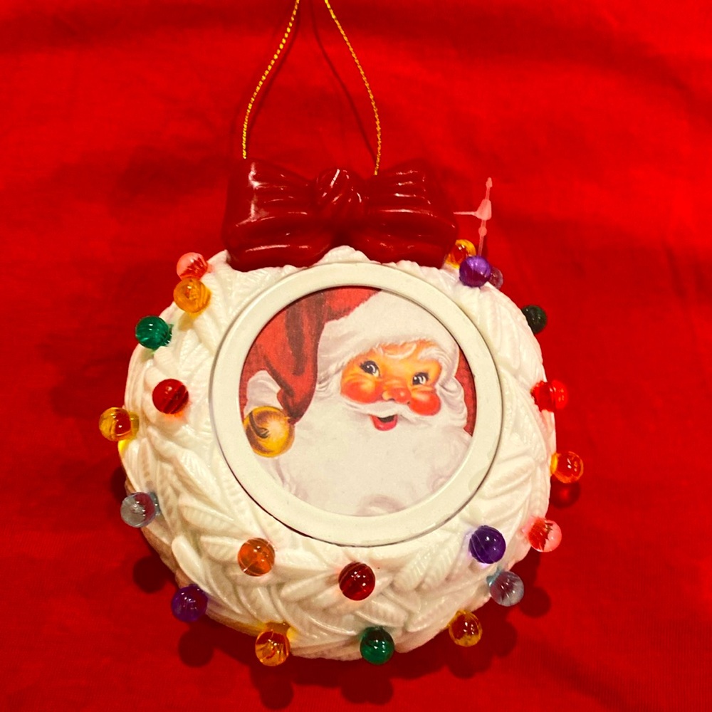 Christmas ornament; record a message. Lights up